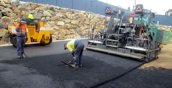 Road surface works, cutting a drain
